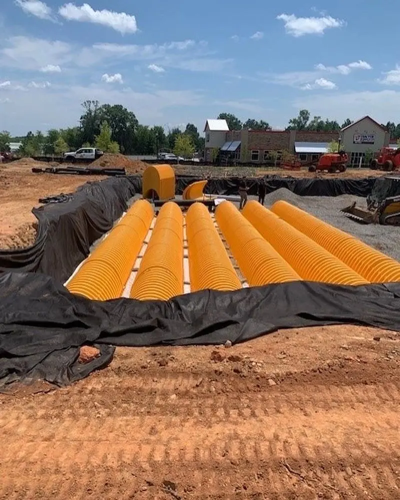 Large underground stormwater detention pipes during installation